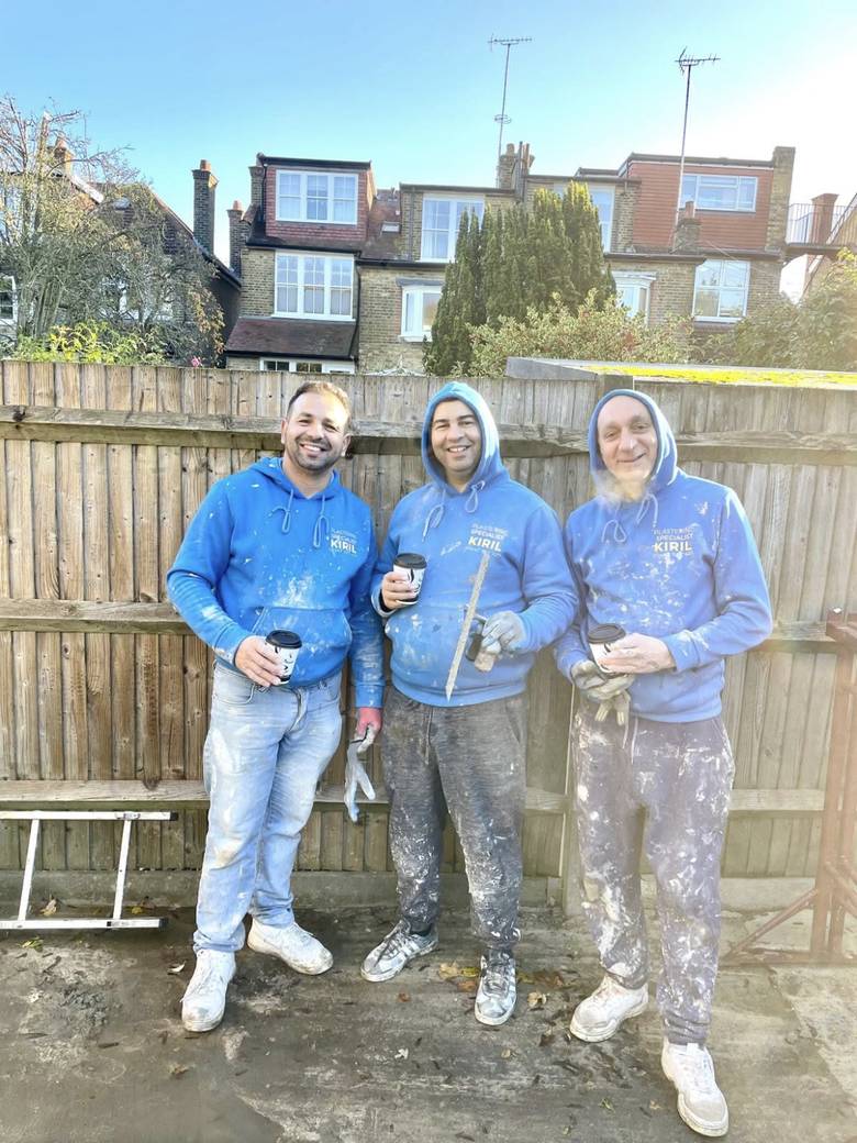 The Kiril Plastering Specialist team in their blue hoodies